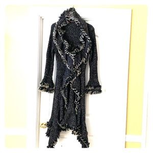 Long sweater coat with fur trim